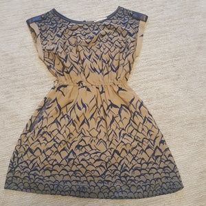 Tan dress with unique details